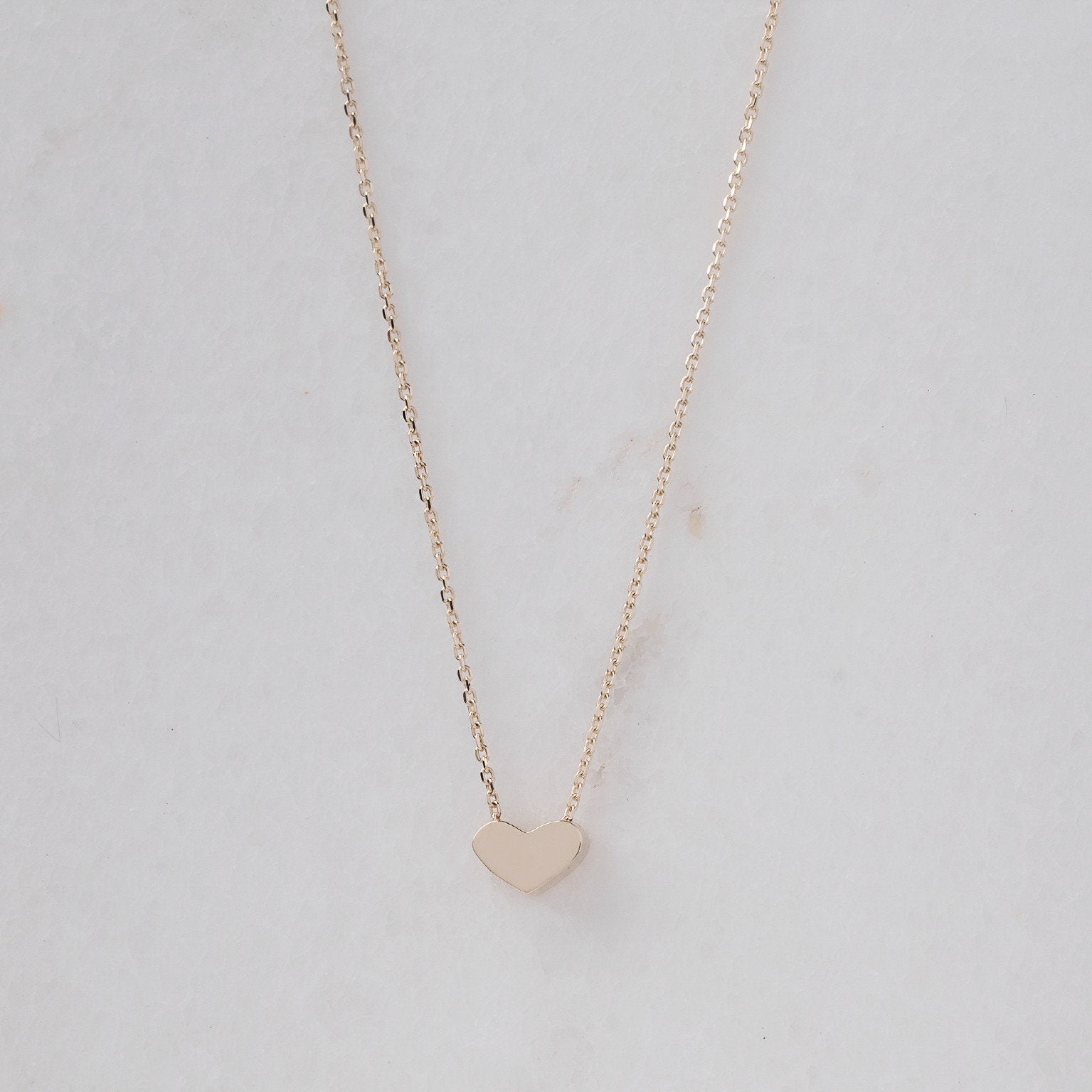 dainty heart necklace in 14k yellow gold