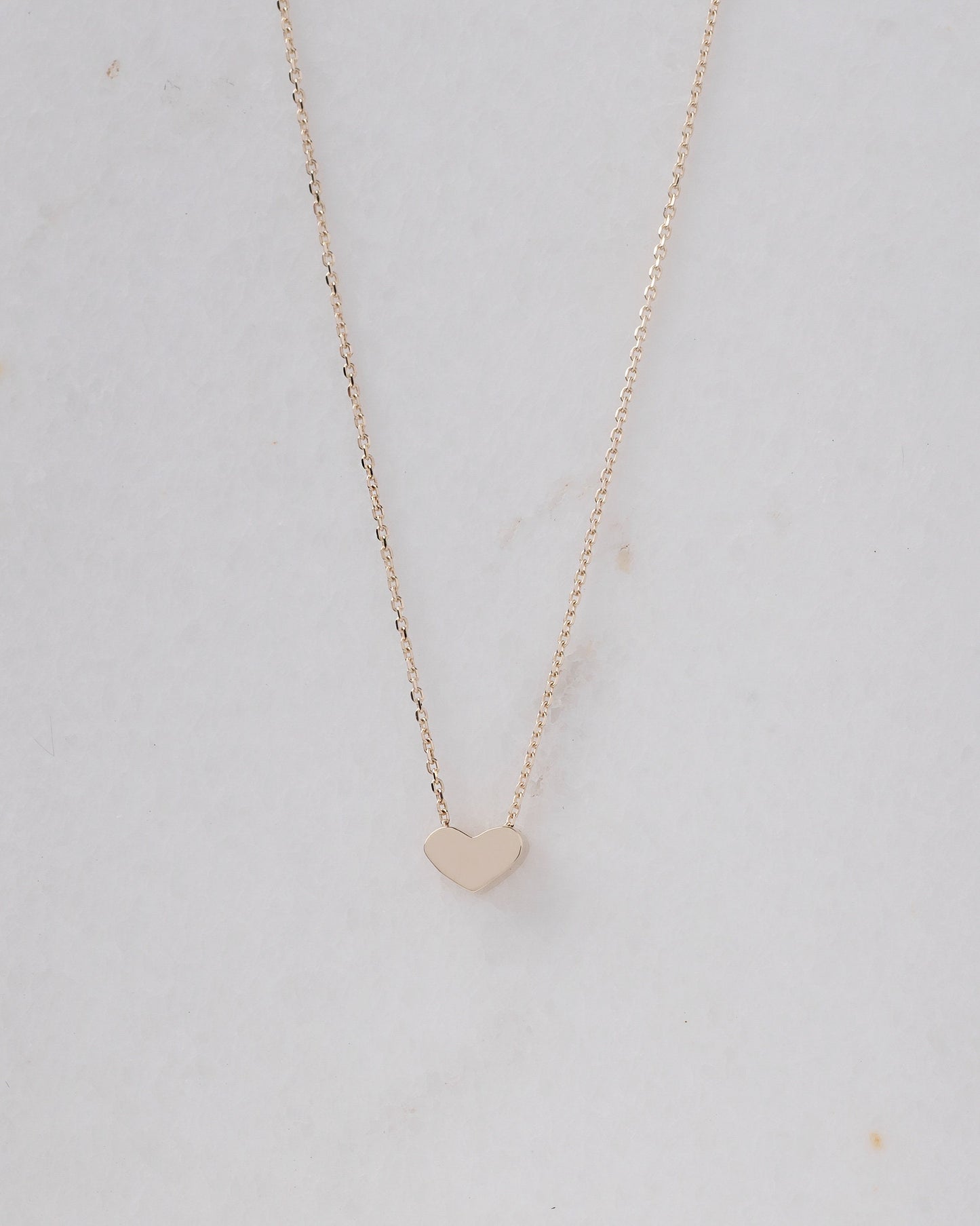 dainty heart necklace in 14k yellow gold