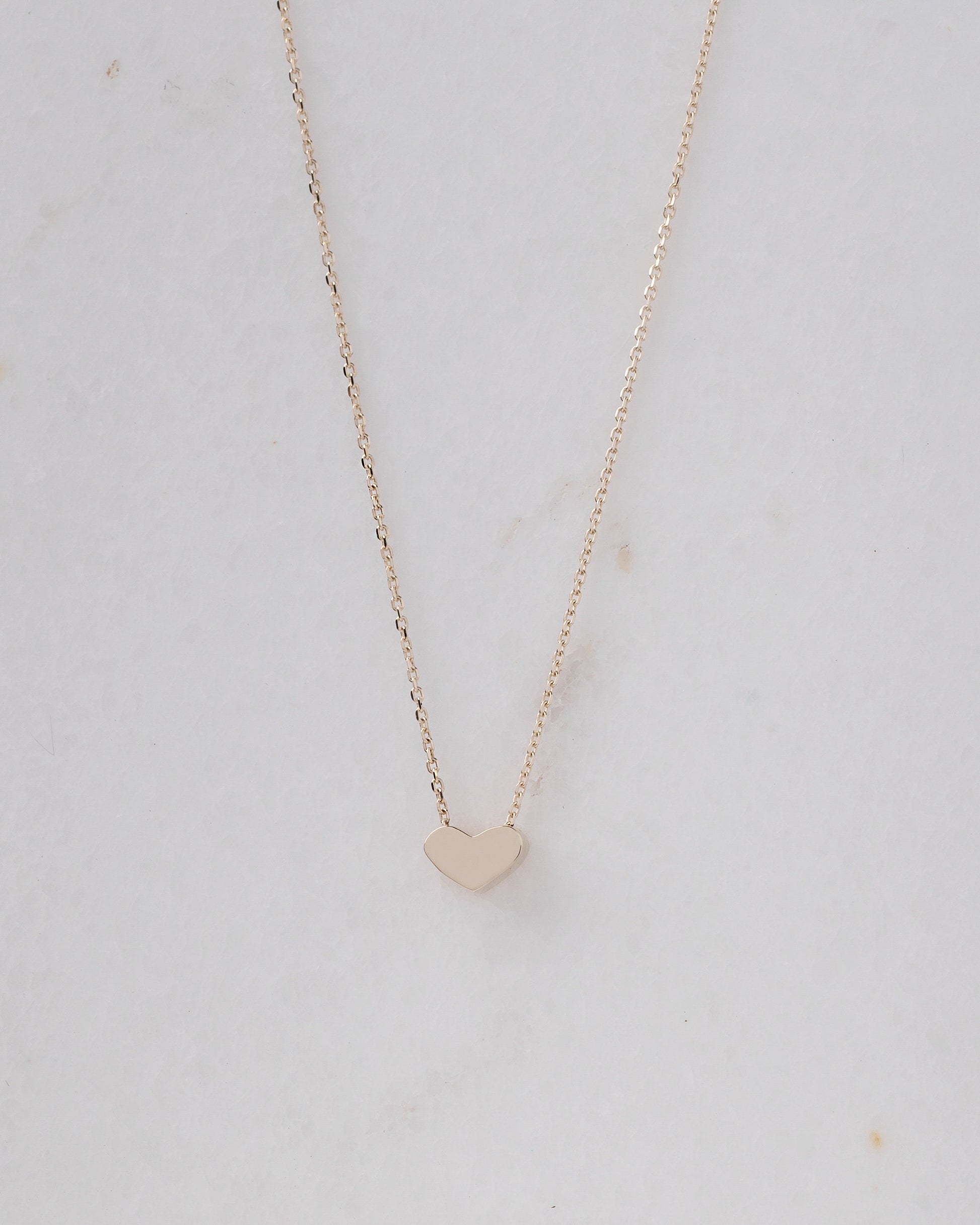 dainty heart necklace in 14k yellow gold