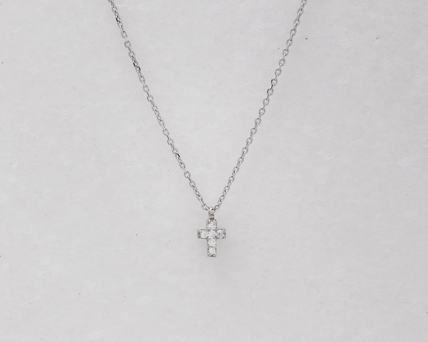 tiny diamond cross necklace in 14k white gold for women