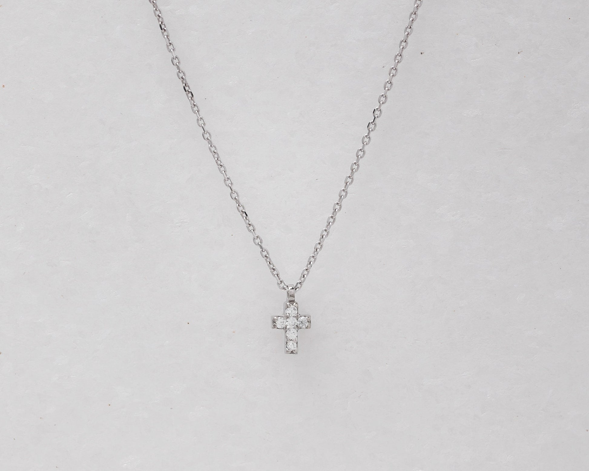 tiny diamond cross necklace in 14k white gold for women