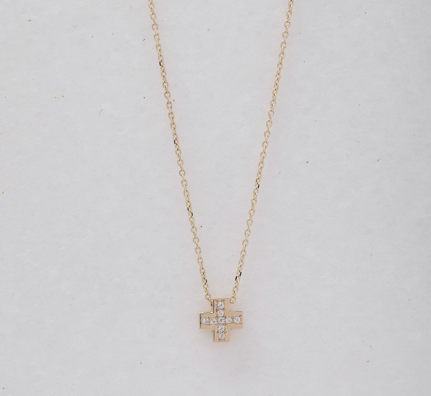 paved small cross necklace in 14k yellow gold for women