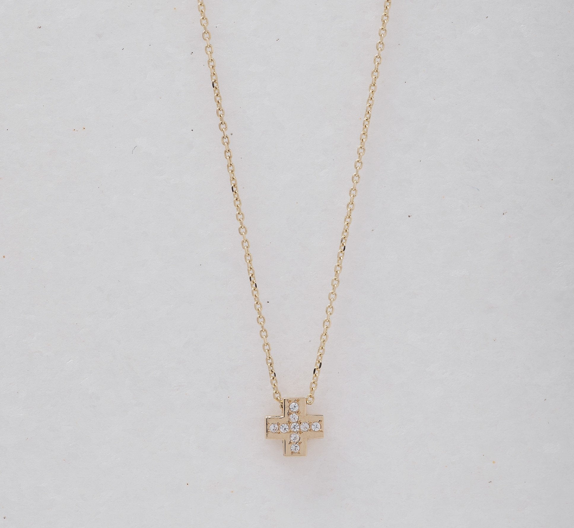 paved small cross necklace in 14k yellow gold for women