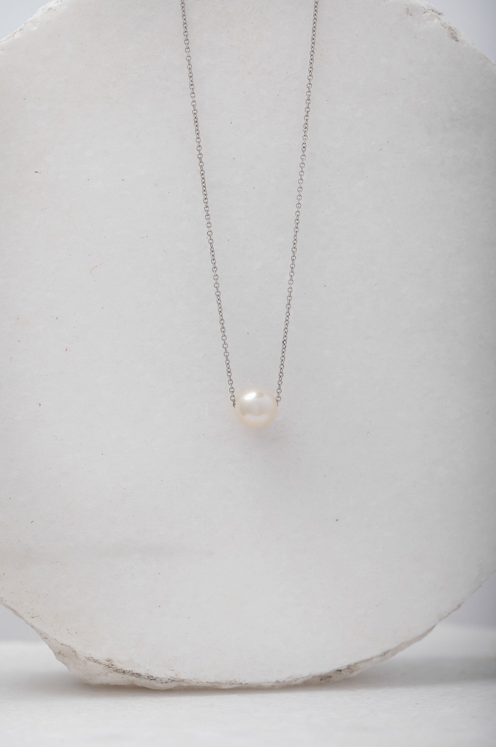 Pearl Necklace Floating in 14k White Gold