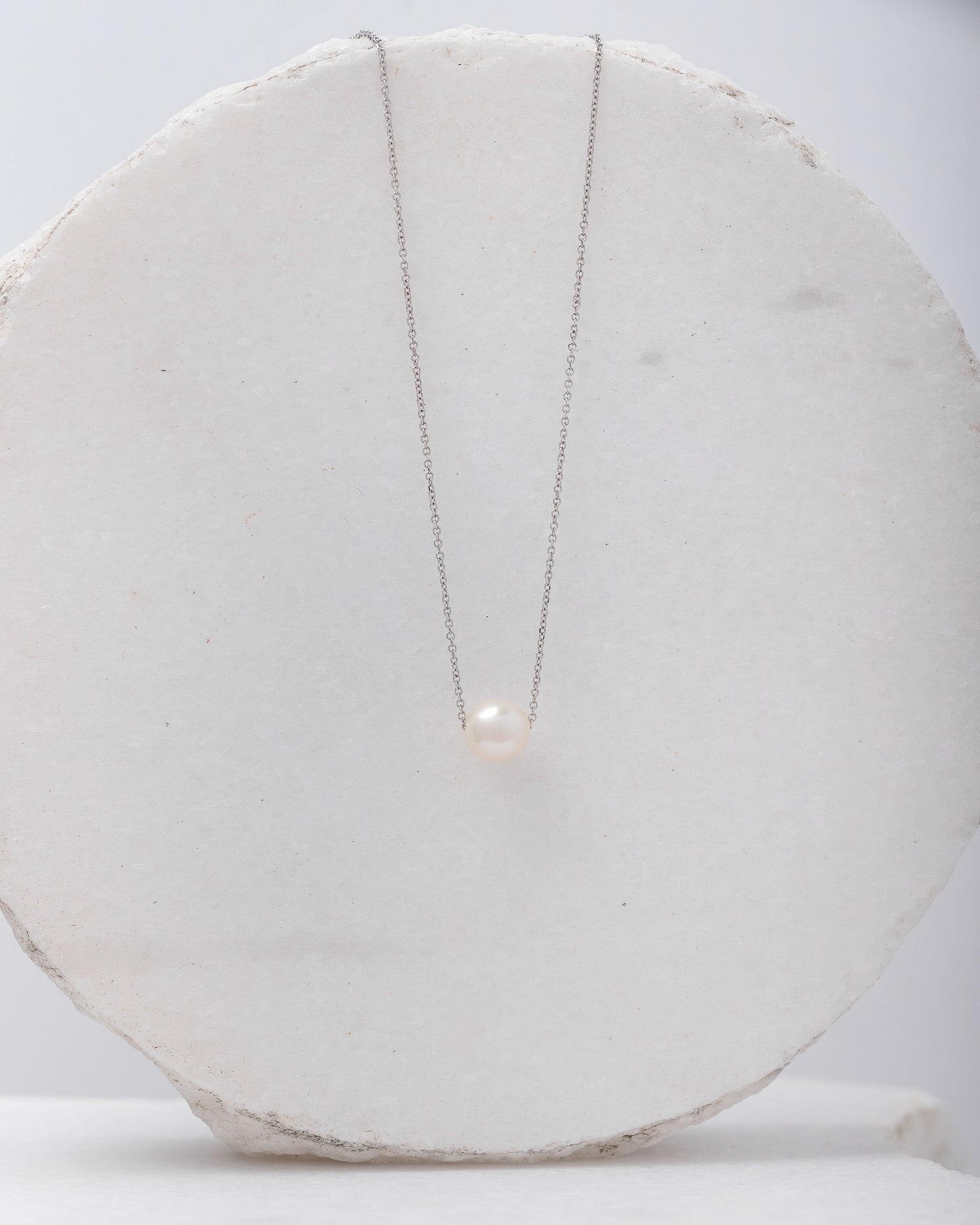 Pearl Necklace Floating in 14k White Gold