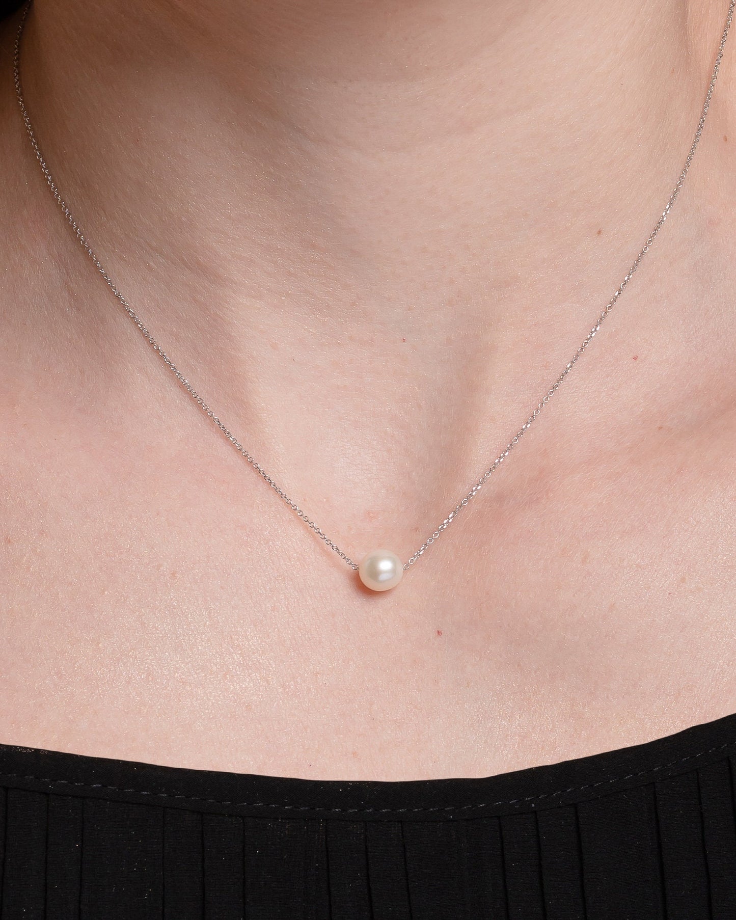 Pearl Necklace Floating in 14k White Gold