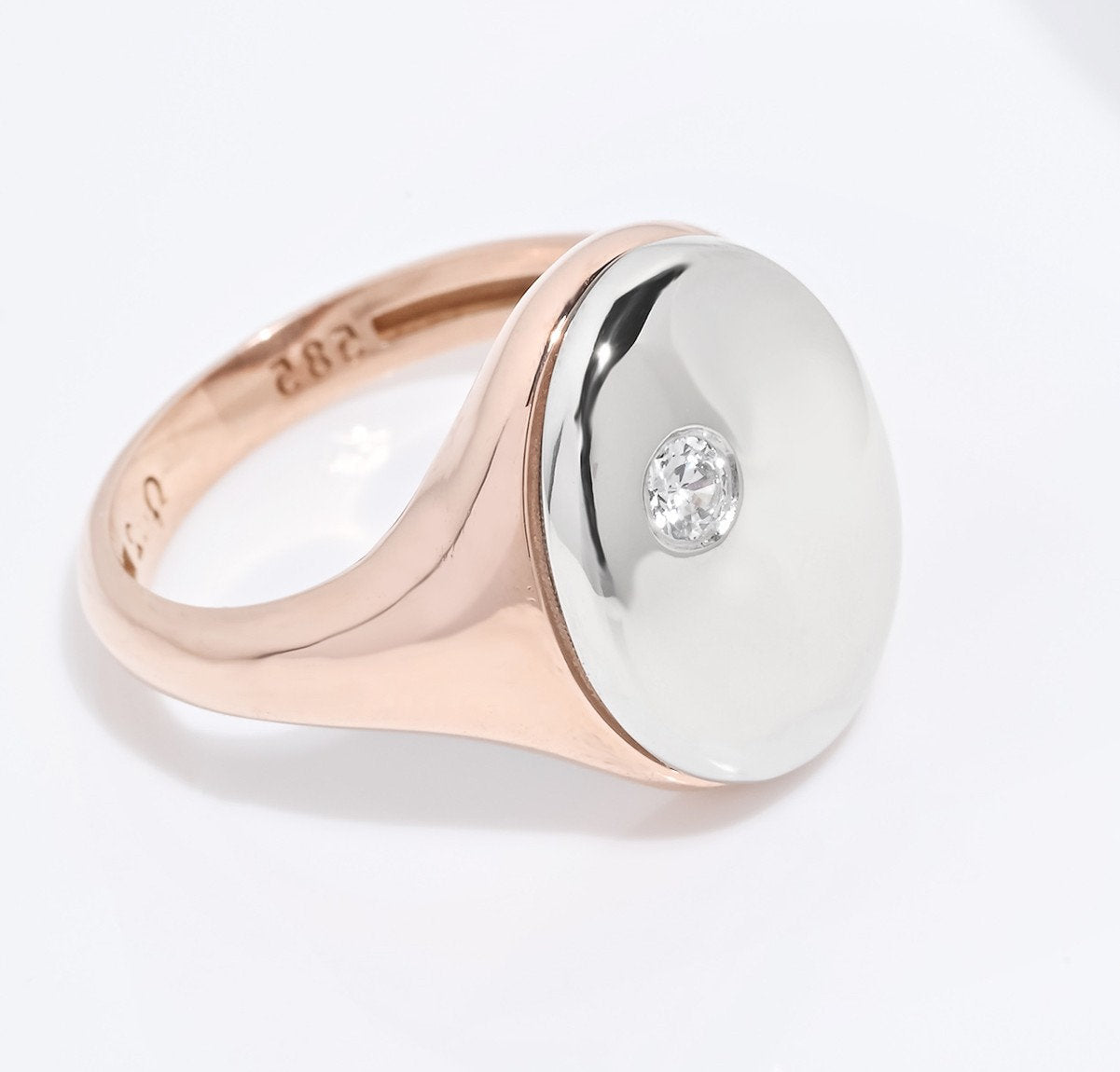 Oval diamond signet rings in 14k yellow gold for women.