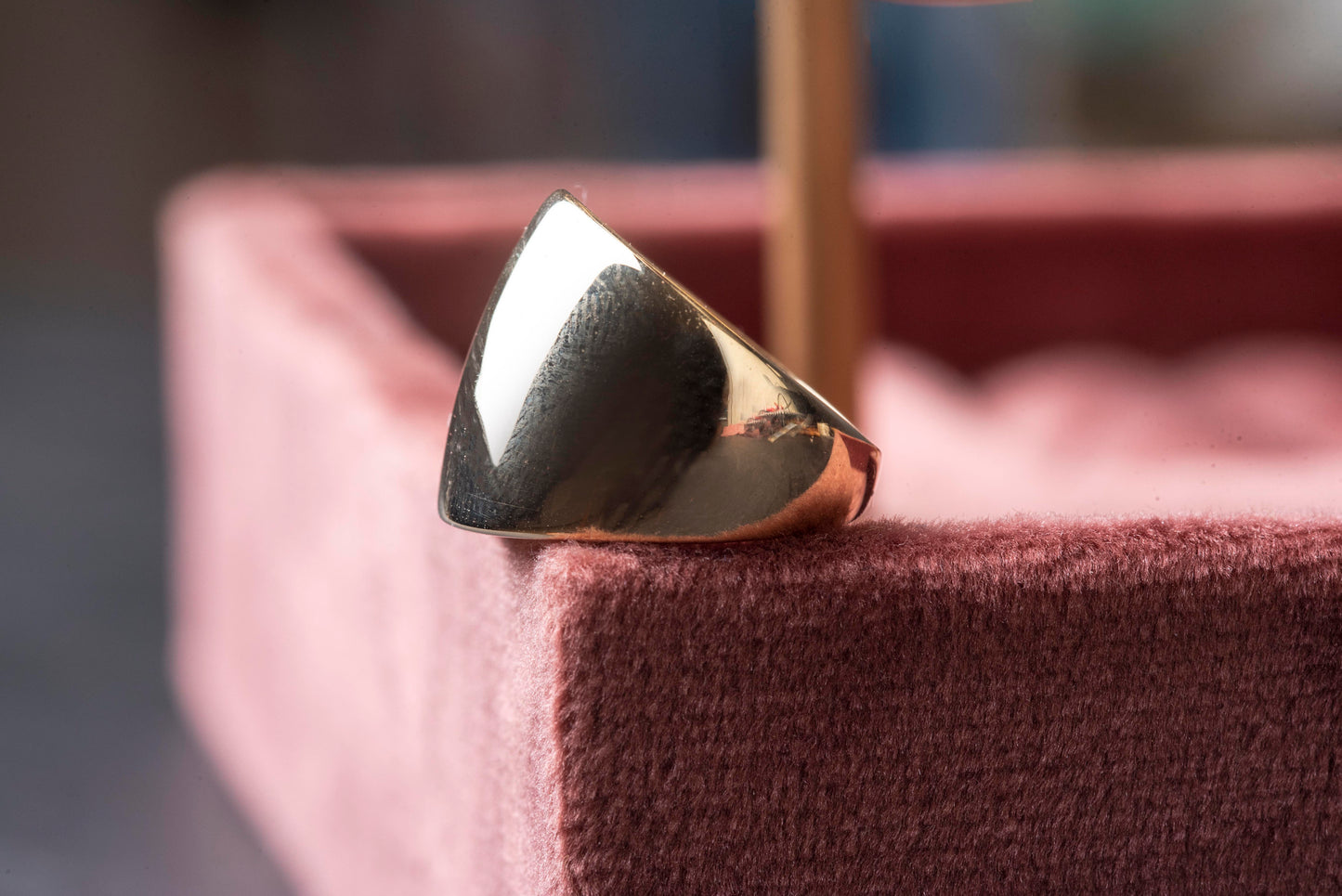 A large dome-shaped signet ring for women, crafted in 14k gold.