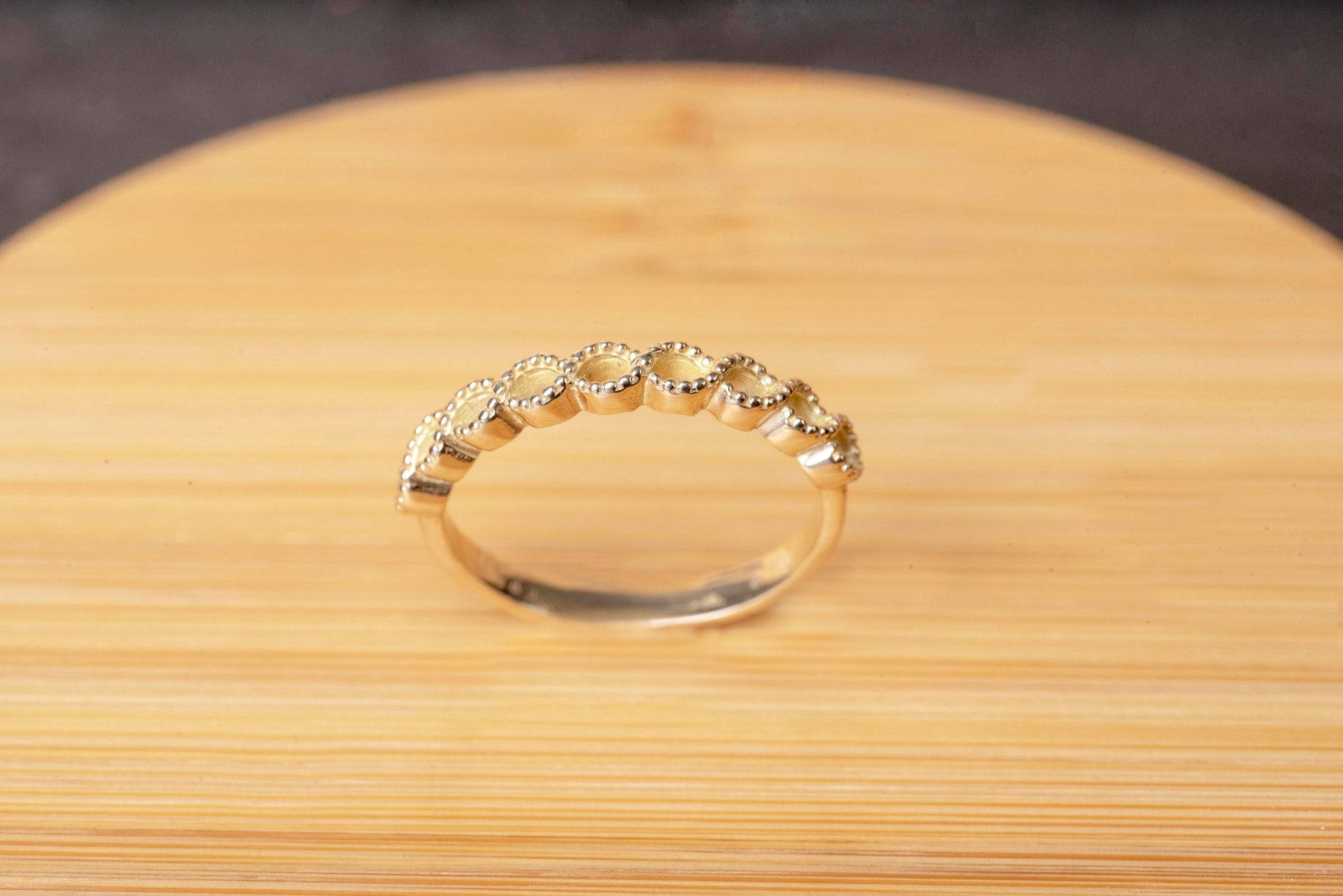 Handcrafted 14k solid gold ring featuring openings on the upper section.