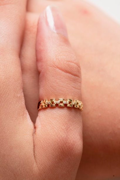 Handcrafted Cuban Link Chain Ring in 14k gold, adorned with white cubic zirconia stones, designed for women.