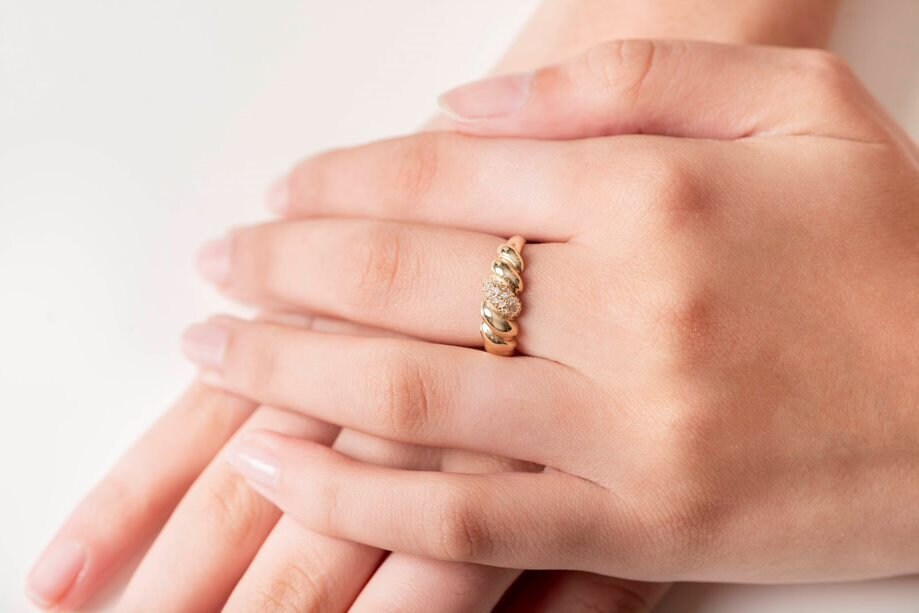 Handmade Croissant Ring in 14k gold, partially paved with white cubic zirconia stones.