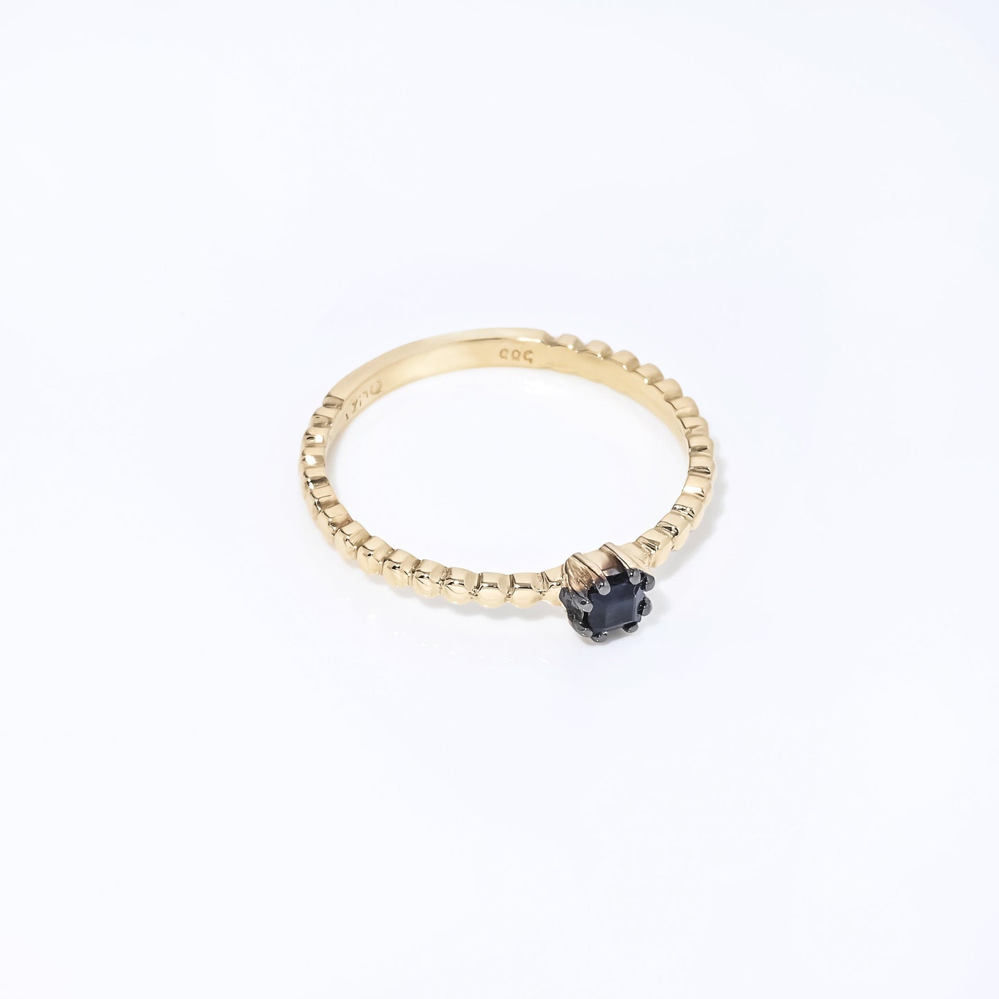 Handmade sapphire beaded ring for women, set in 14k gold with a prong setting.