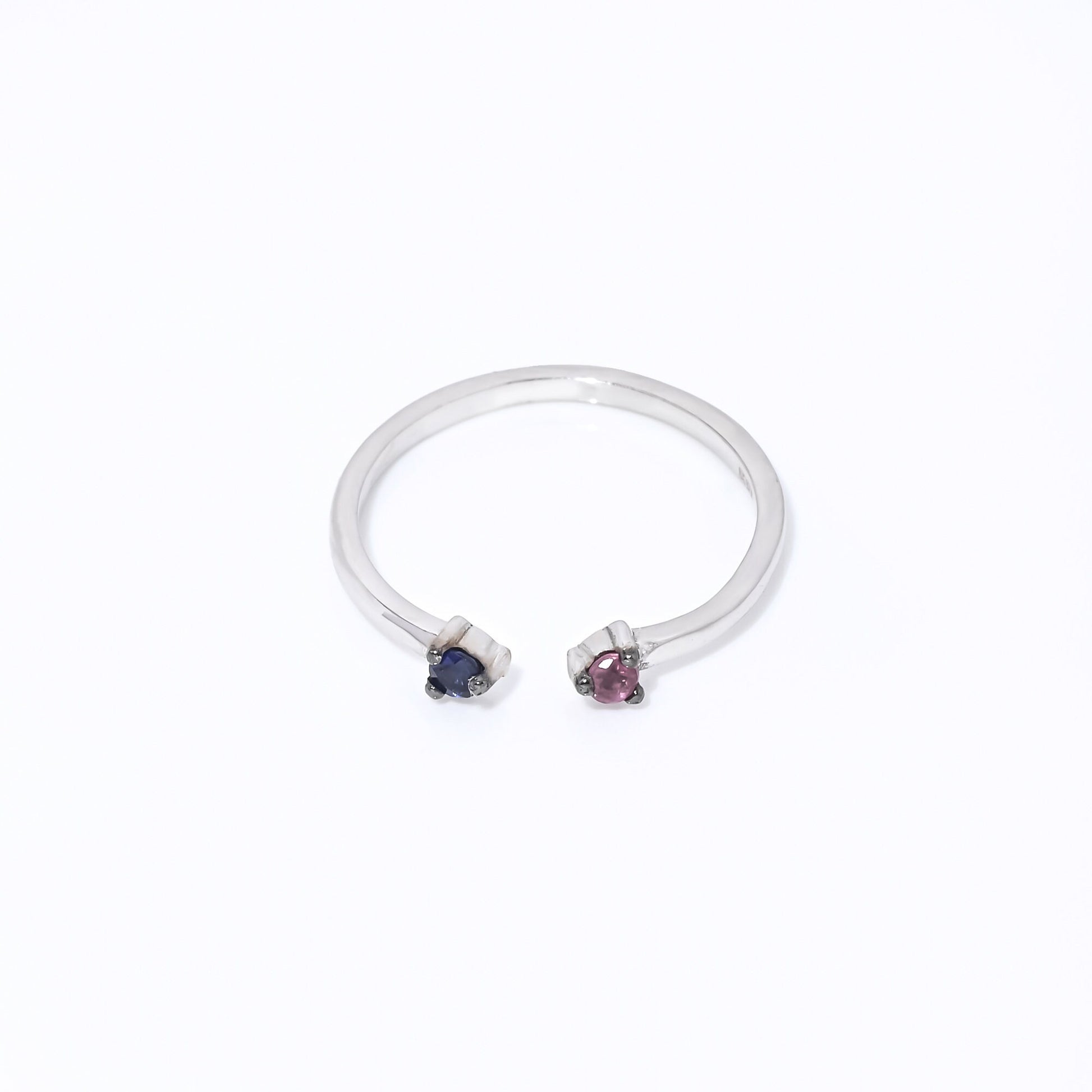 Handcrafted open cuff ring featuring rubies and sapphires, set in 14k gold for women.