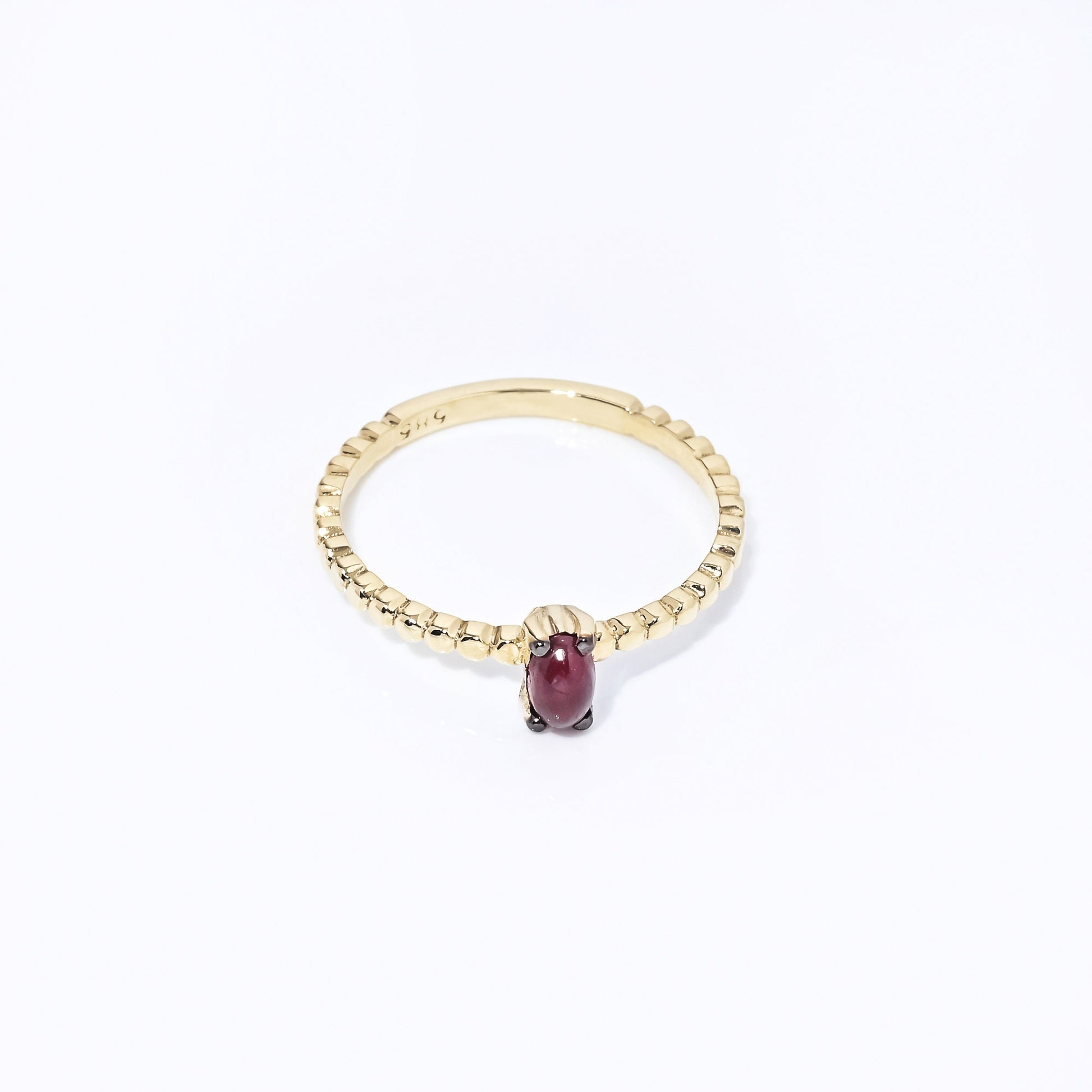 Handmade 14K gold ring with ruby beads for women, set in prongs.