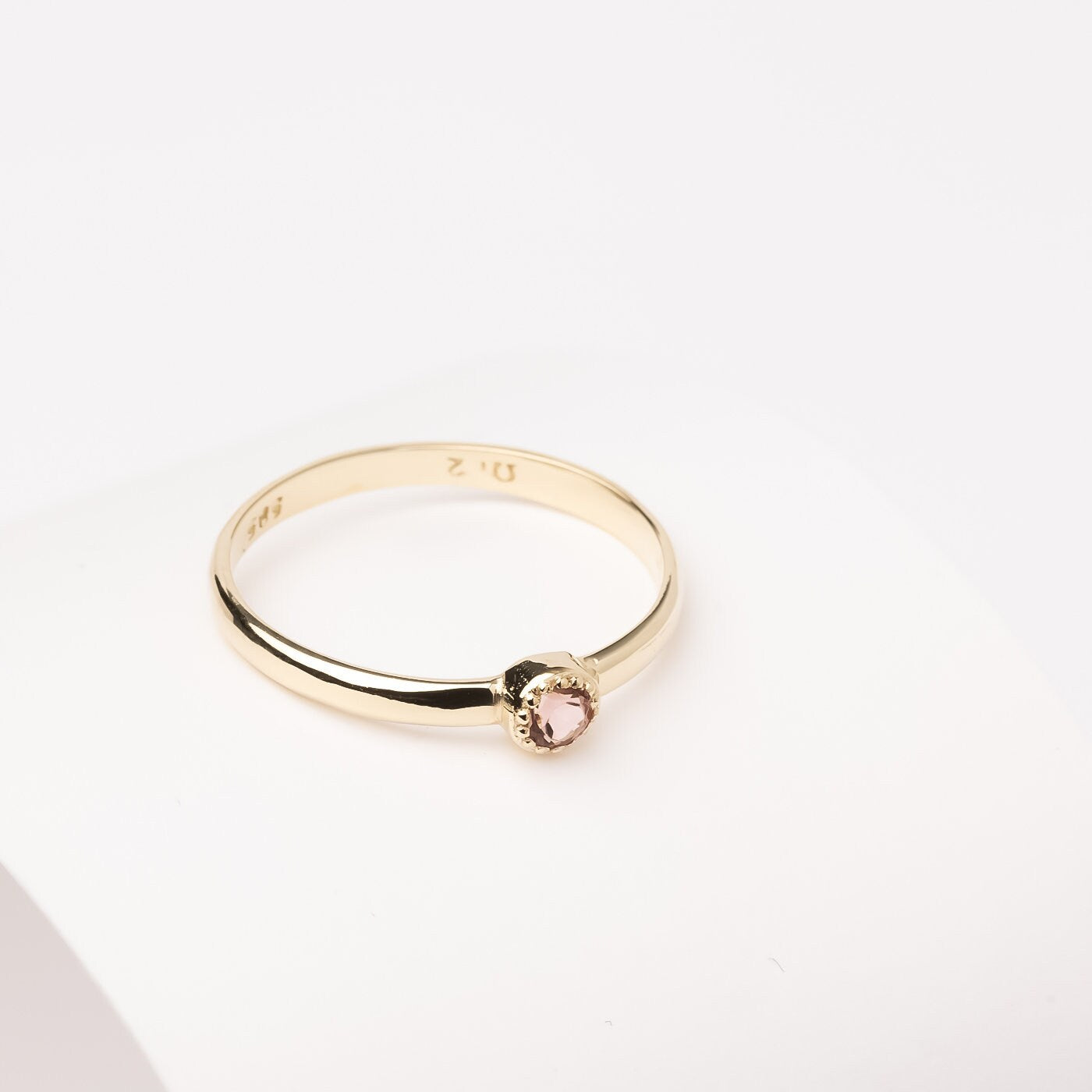 Handcrafted birthstone ring for women, set in 14k gold with a prong setting.