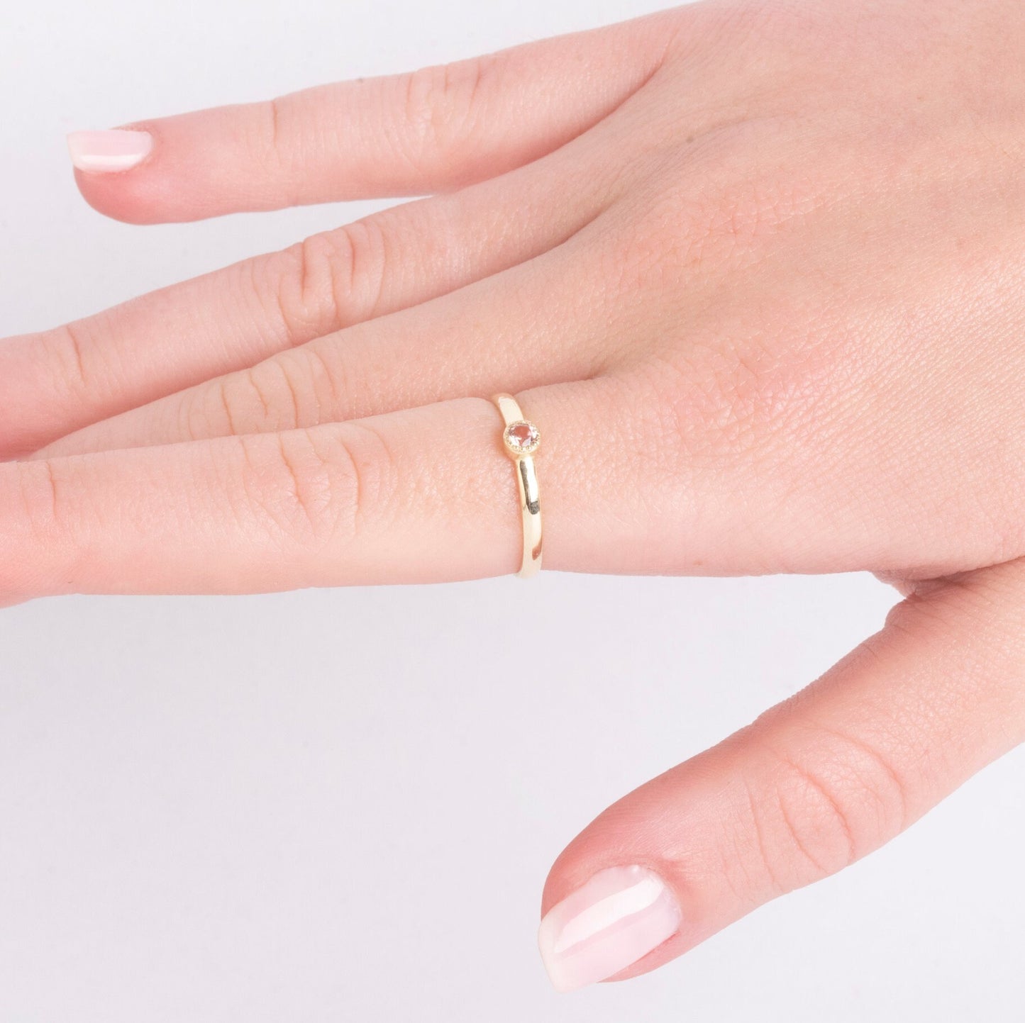 Handcrafted birthstone ring for women, set in 14k gold with a prong setting.