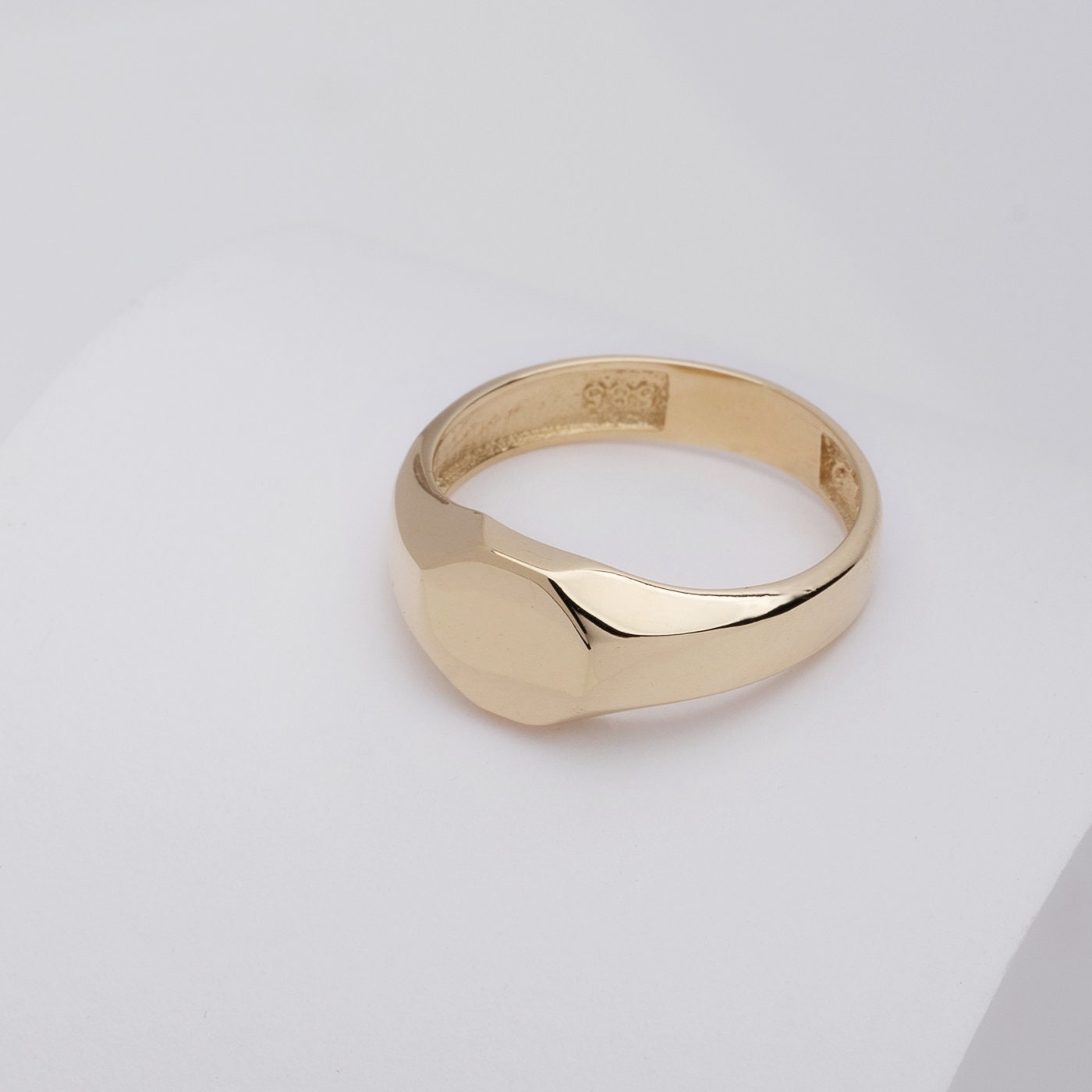 Minimalist Personalized Signet Ring in 14K Gold for women, with the top part being engravable.